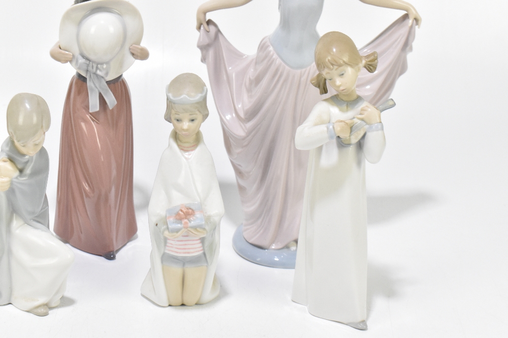 LLADRO; five figures including a dancing girl wearing a tiara and flowing dress, height 32cm, also a - Image 3 of 6