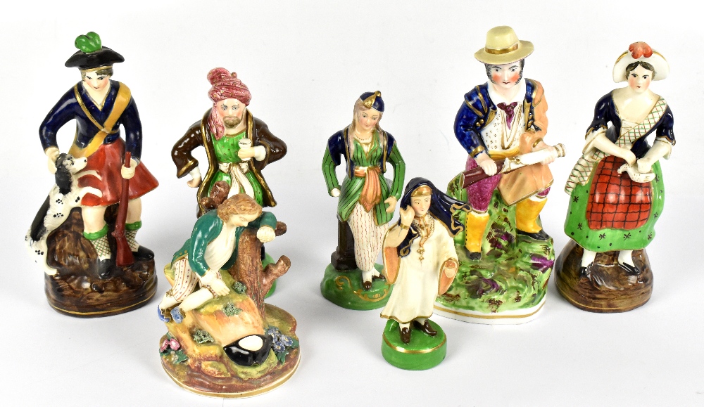 Seven 19th century figures including a hunter holding a blunderbuss, a further figure of a