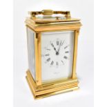 J. BENNETT PARIS; a brass cased repeating carriage clock, the enamel dial set with both Arabic and