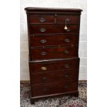 An early 19th century mahogany chest on chest, the upper section with two short and three long