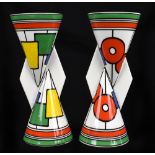 WEDGWOOD; a pair of Yoyo vases after Clarice Cliff decorated in the 'Circles & Squares' pattern,