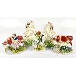 Five 19th century Staffordshire figures including two examples of cattle, a pair of examples of