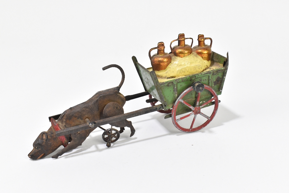 A 1920s tinplate toy modelled as a dog pulling a cart with three bottles titled 'Anvers', length - Image 2 of 4