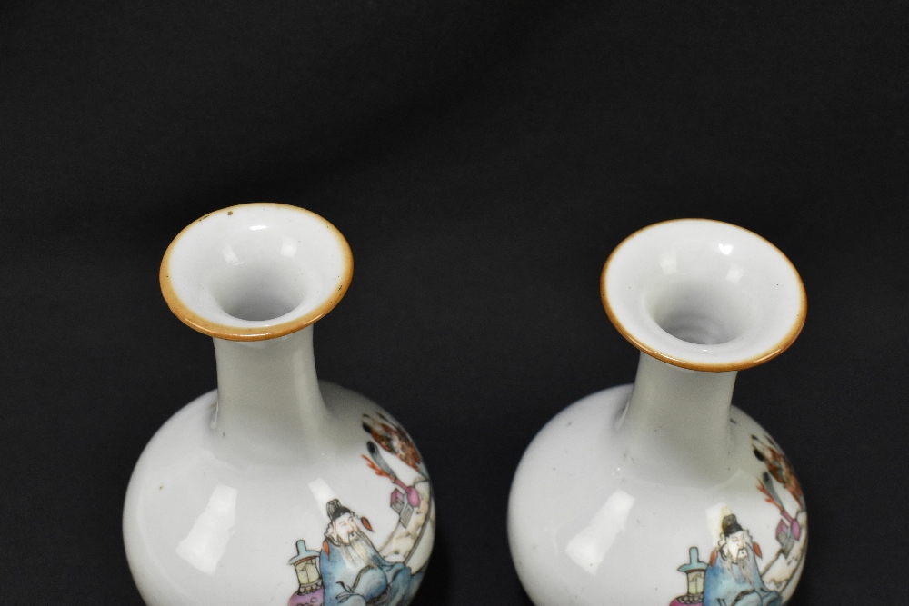 A pair of late 19th century Chinese porcelain bulbous vases with flared necks, each decorated with - Image 5 of 6