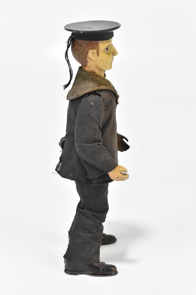 LEHMANN; a tinplate clockwork figure of a dancing sailor c1910, with cotton clothes and hat marked - Bild 2 aus 6