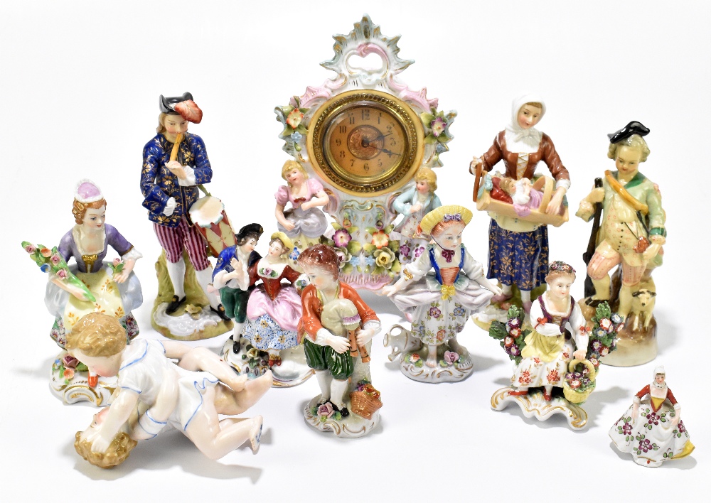 A collection of Continental porcelain figures, including a pair of Plaue-on-Havel (Thuringia)