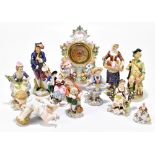 A collection of Continental porcelain figures, including a pair of Plaue-on-Havel (Thuringia)