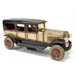 TIPP & CO; a 1930s German tinplate clockwork limousine in red, black and gold, length 24cm.