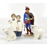 SITZENDORF; a French porcelain figure of a soldier, height 24cm, together with two Lladro figures of