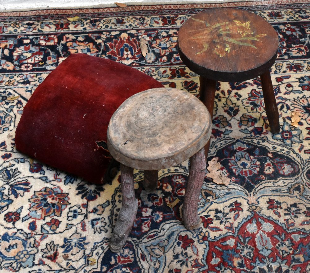 Two rustic milking stools and a Victorian curved footstool (3).