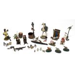 A collection of late 19th century and later metal animals and figures, to include, three vintage