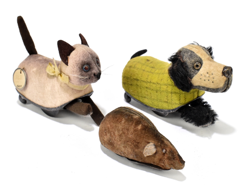 SCHUCO; three clockwork model animals comprising dog, cat and mouse, longest 12cm, and a clockwork