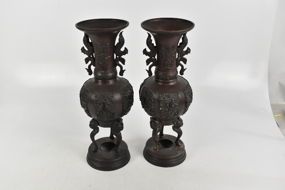 A pair of Japanese Meiji period bronze vases with moulded twin handles, height 43cm (2). - Image 3 of 6
