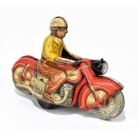 SCHUCO; a German tinplate clockwork motorcycle, Carl 1005, with rider, length 12cm. PROVENANCE: