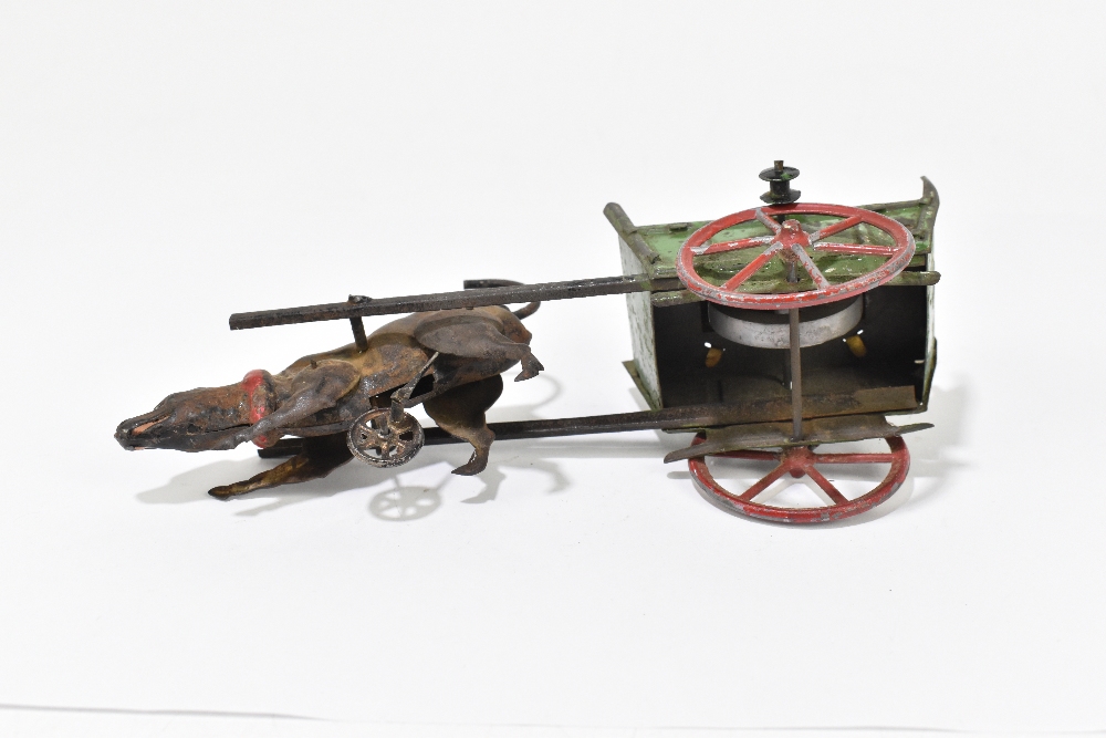 A 1920s tinplate toy modelled as a dog pulling a cart with three bottles titled 'Anvers', length - Image 4 of 4