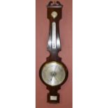 KEYNON OF STOCKPORT; an early 19th century rosewood wheel barometer, length 110cm.