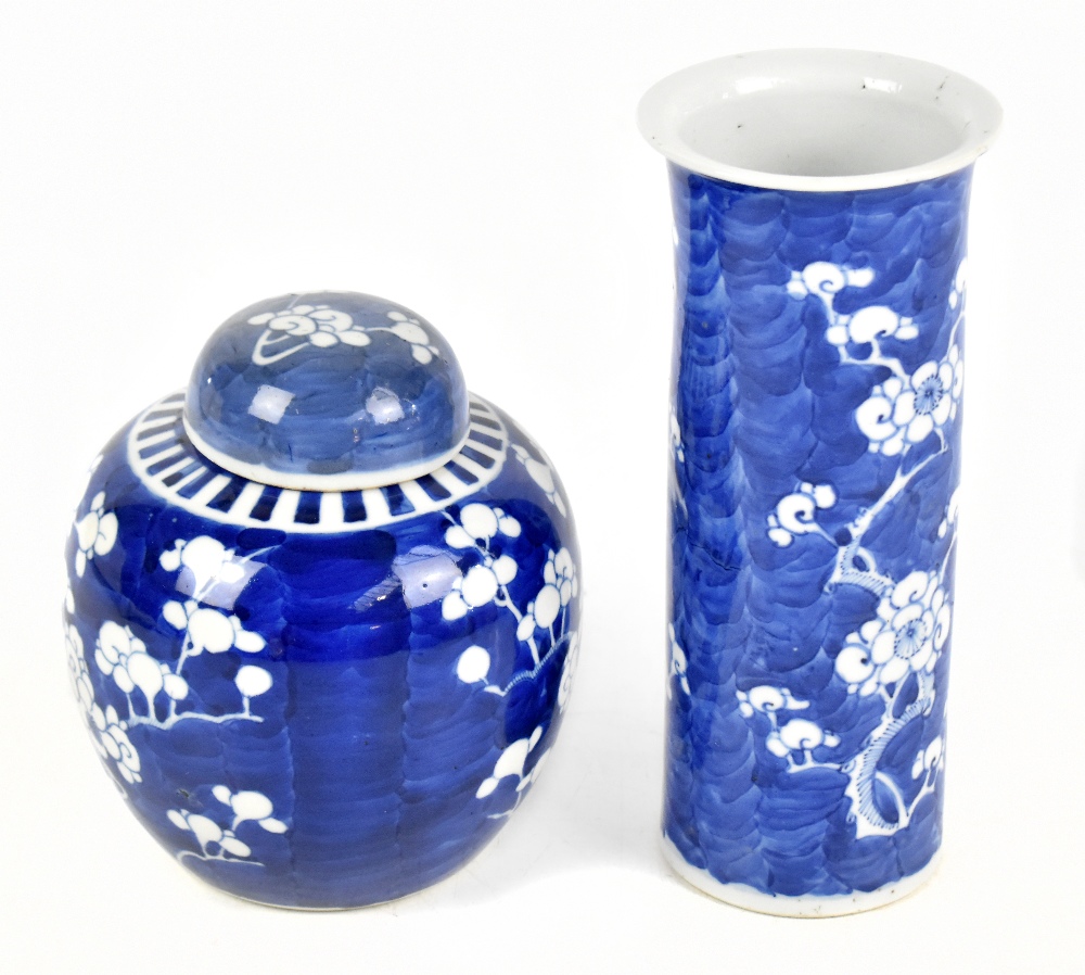 An early 20th century Chinese blue and white porcelain sleeve vase decorated with prunus flowers,
