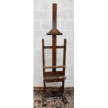 YOUNG OF LONDON; a patented oak adjustable artist's easel, height 191cm, width 48cm.