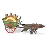 A 1920s tinplate toy modelled as a dog pulling a cart with three bottles titled 'Anvers', length