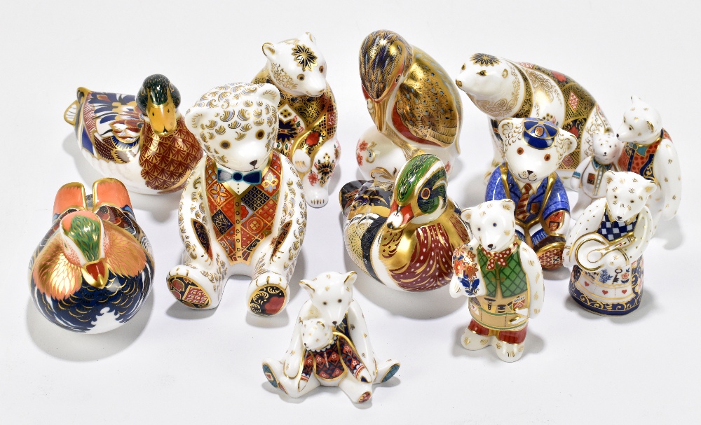 ROYAL CROWN DERBY; a collection of twelve animal formed paperweights including 'Caroline Duck', '