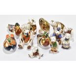 ROYAL CROWN DERBY; a collection of twelve animal formed paperweights including 'Caroline Duck', '