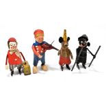 SCHUCO; four German clockwork figures comprising Dutch boy violinist, mouse, clown with a suitcase