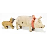 ROULLET & DECAMPS; a late 19th/early 20th century French clockwork automaton model of a pig and dog,