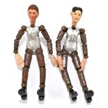 BUCHERER SABA; two Swiss jointed metal dolls, both with male heads, length 20cm (2). PROVENANCE: The