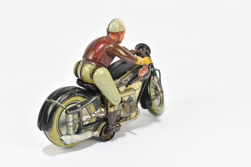 ARNOLD; a MAC 700 German tinplate clockwork motorcycle and rider, length 19cm. PROVENANCE: The - Bild 3 aus 5