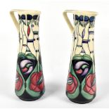 MOORCROFT; a pair of ewers decorated in the 'Tribute to Charles Rennie Mackintosh' pattern, height