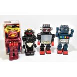 Four battery operated toy robots including a boxed Tovtoy, and three unboxed Chinese robots (4).