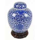A 19th century Chinese blue and white porcelain ginger jar and cover painted with lotus flowers