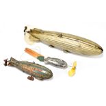 TIPP & CO; a German tinplate clockwork model of the Hindenburg, length 28cm, with a smaller model of