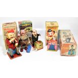 Three boxed Japanese battery operated toys comprising 'McGregor' by Rosko Toys, 'The Sherriff' by