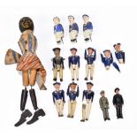 A collection of eight carved and painted wood miniature sailor dolls with jointed arms and legs,