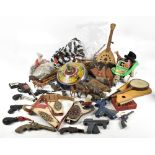 A miscellany of vintage toys to include a spinning top, various guns, a table top croquet set,