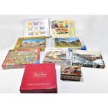 An assortment of post war and modern jigsaw puzzles, various makers and sizes.  PROVENANCE: The