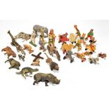 An assortment of vintage and later wooden toys including figures, animals and andromorphic figures.