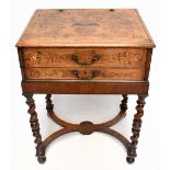 A 19th century Dutch marquetry inlaid two drawer chest on stand of rectangular form, with shaped