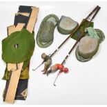 SCHOENHUT; two 1920’s mechanical golf game painted wooden figure and shafts, Tommy Green and