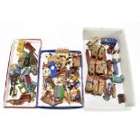 A collection of vintage wooden toys, mostly vehicles including commercial and farm, various figures,