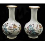A pair of late 19th century Chinese porcelain bulbous vases with flared necks, each decorated with