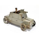 BURNETT LTD; a 1930s English tinplate clockwork armoured vehicle, length 18.5cm. PROVENANCE: The