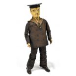 LEHMANN; a tinplate clockwork figure of a dancing sailor c1910, with cotton clothes and hat marked