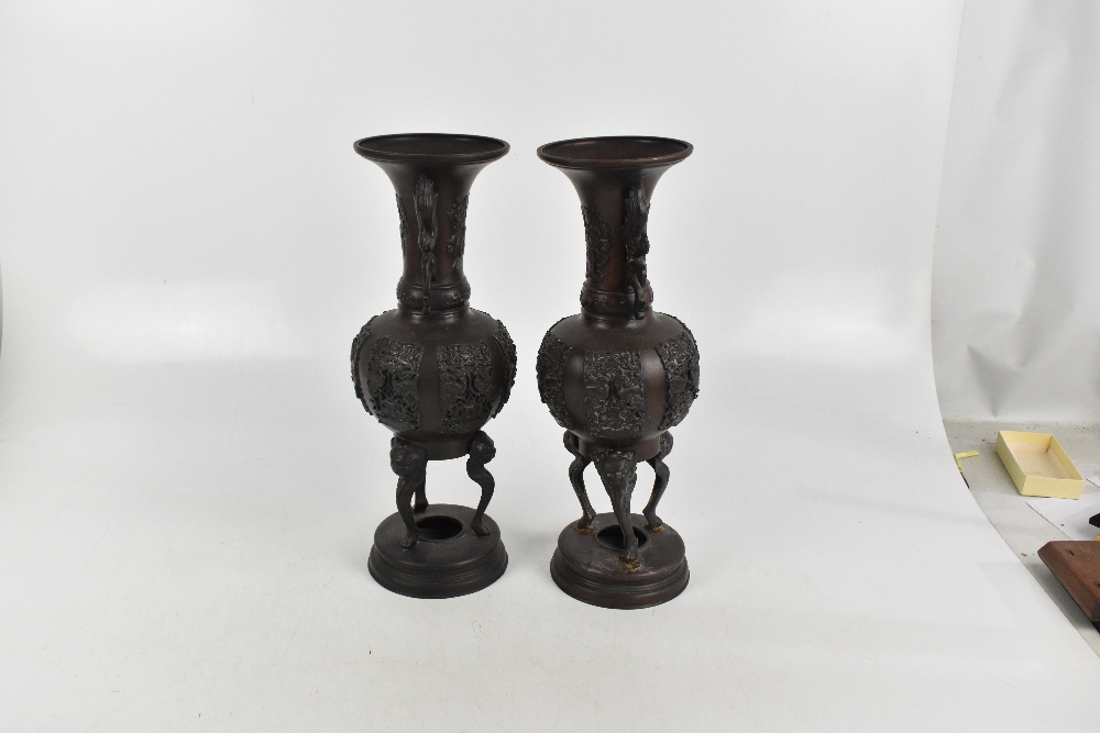 A pair of Japanese Meiji period bronze vases with moulded twin handles, height 43cm (2). - Image 4 of 6