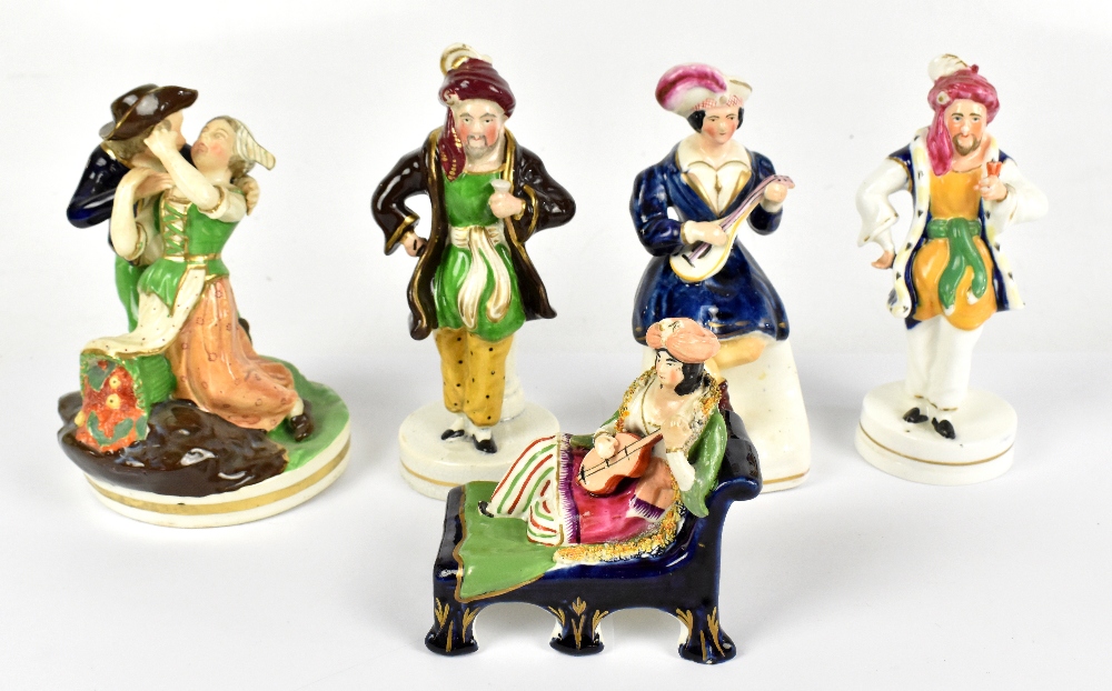 Five 19th century ceramic figures including a Staffordshire example of a Scot seated playing a lute,