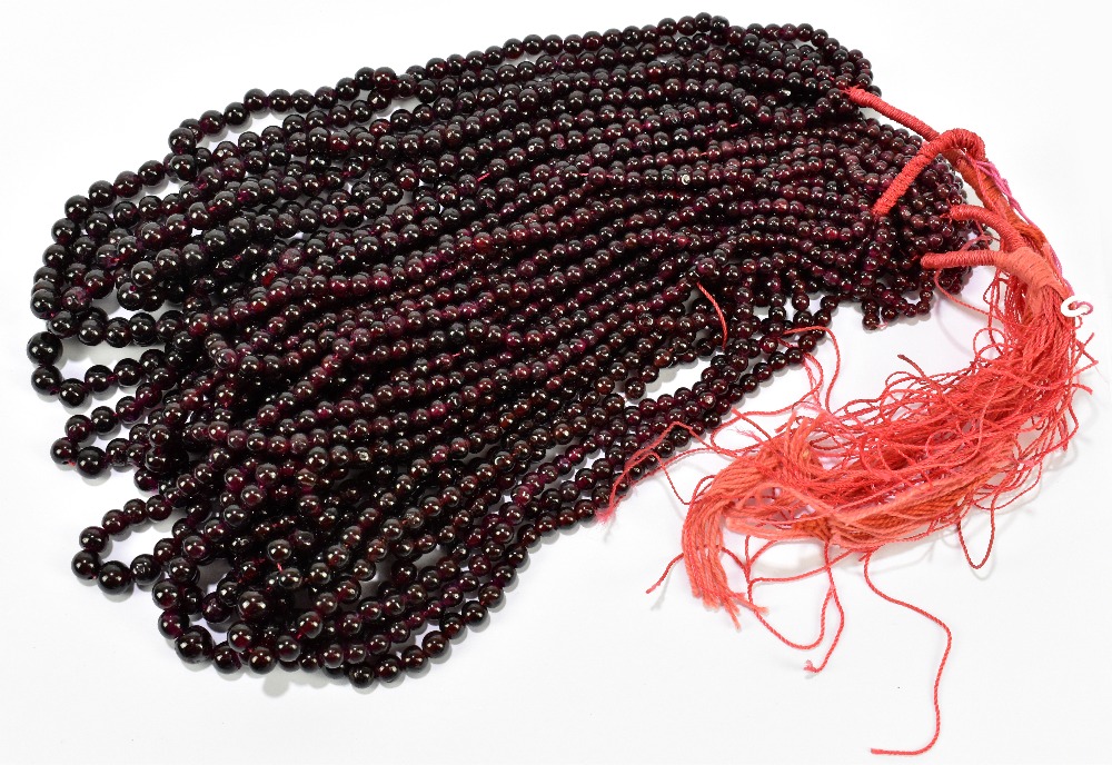 GARNET; twenty cabochon bead necklaces ranging from 3mm to 7mm.