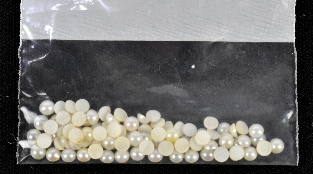 CULTURED JAPANESE PEARLS; one hundred 3mm diameter cabochons.