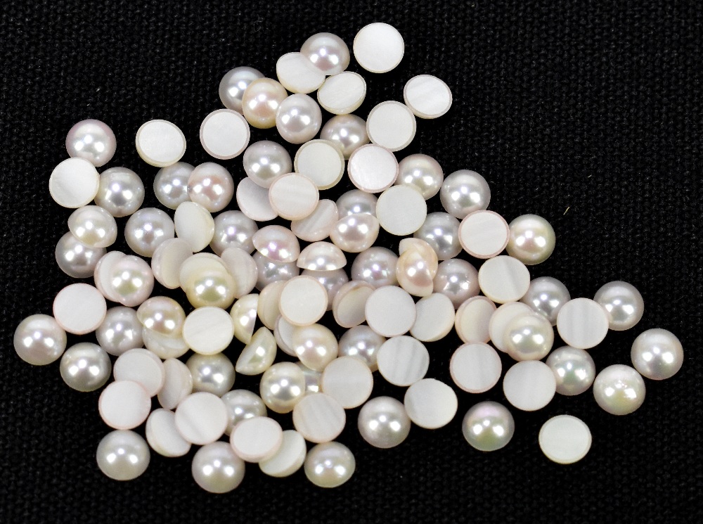 CULTURED JAPANESE PEARLS; one hundred 4mm diameter round cabochons.