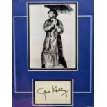 Movie memorabilia and autograph. Gene Kelly, Singing In The Rain. With a b/w photo, and a signed